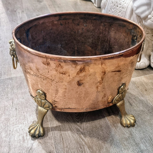 Copper and brass log bin.